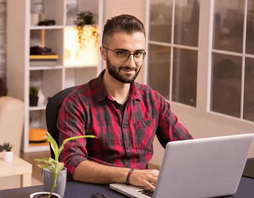 Garage owner managing workshop operations at a desk